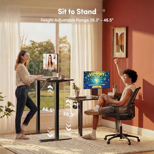 FEZIBO 55 x 24 Inchs Electric Standing Desk, Height Adjustable, Sit Stand Up, Computer Office Desk with Splice Board, Black Frame/Black Walnut Top