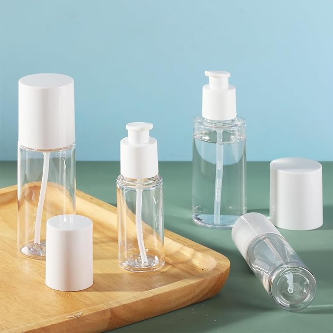 Travel Pump Bottle 2pcs Cosmetic Pump Container Refillable Clear Lotion Bottles for Cream and Pure Essential Oils to Travel and Bathroom