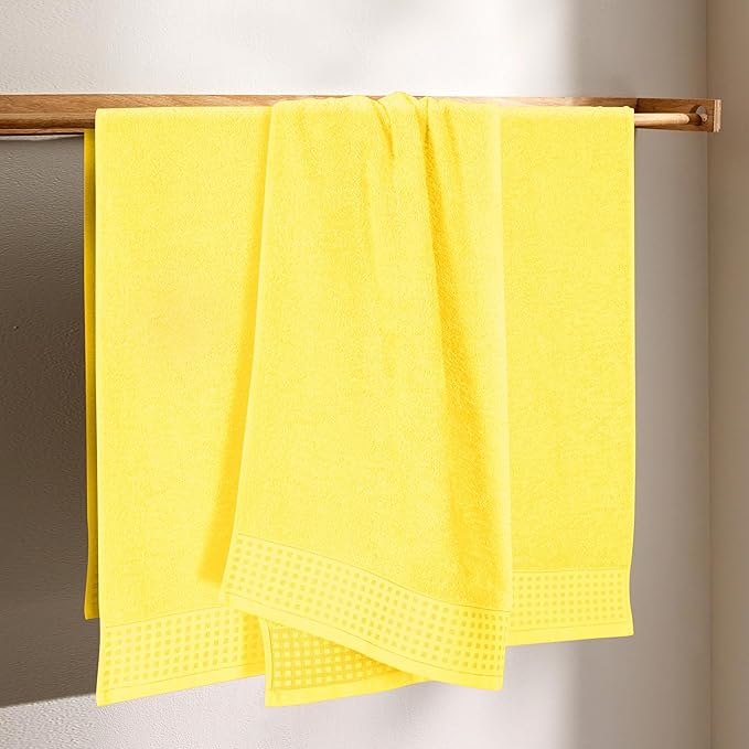 GLAMBURG Ultra Soft 4 Pack Oversized Bath Towel Set 27x54 inches, 100% Cotton Bath Towels, Highly Absorbant Compact Quickdry & Lightweight Towel, Ideal for Gym Travel Camp Pool - Lime Yellow