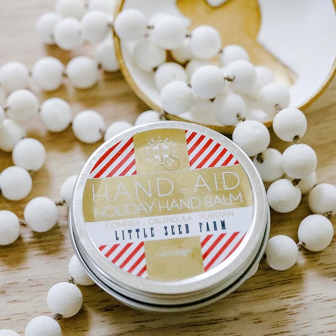 Little Seed Farm - Holiday Hand-Aid – Holiday Hand Moisturizer Balm – Natural, Organic Hand Skin Care with Holiday Scent – Hand Care Balm with Organic Oils & Beeswax – Net Wt. 1.5oz