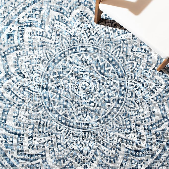 SAFAVIEH Washable Rug Outdoor Courtyard Collection - 9' x 12', Ivory & Navy, Non-Shedding & Easy Cleaning, Ideal for Patio, Backyard, Mudroom (CY8734-53412)